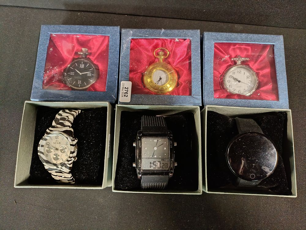 Lot 423: Selection of watches some new and sealed