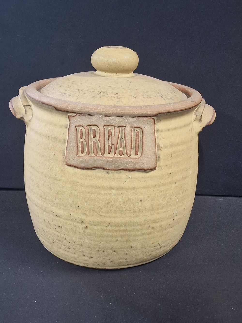 Lot 152: A large stoneware bread bin made by John...