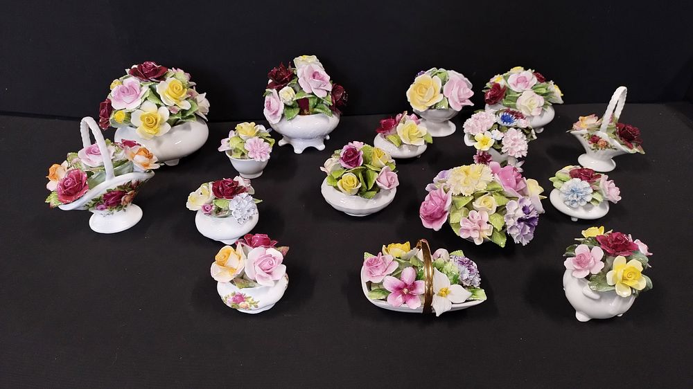 Lot 217: Sixteen floral displays from Royal Albert, Royal Doulton,...