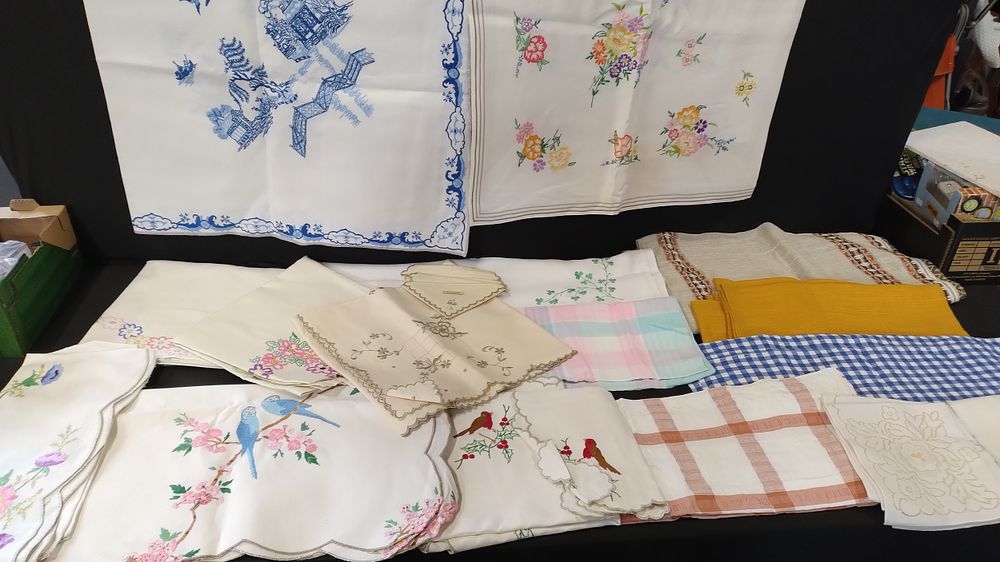 Lot 219: A quantity of Vintage tablecloths.