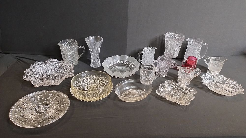 Lot 246: Collection of cut crystal vases, jugs and plates,and...