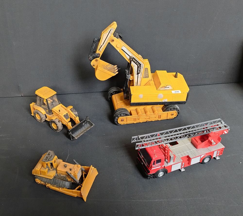 Lot 253: Various toy construction dozers and megaton bucket digger...