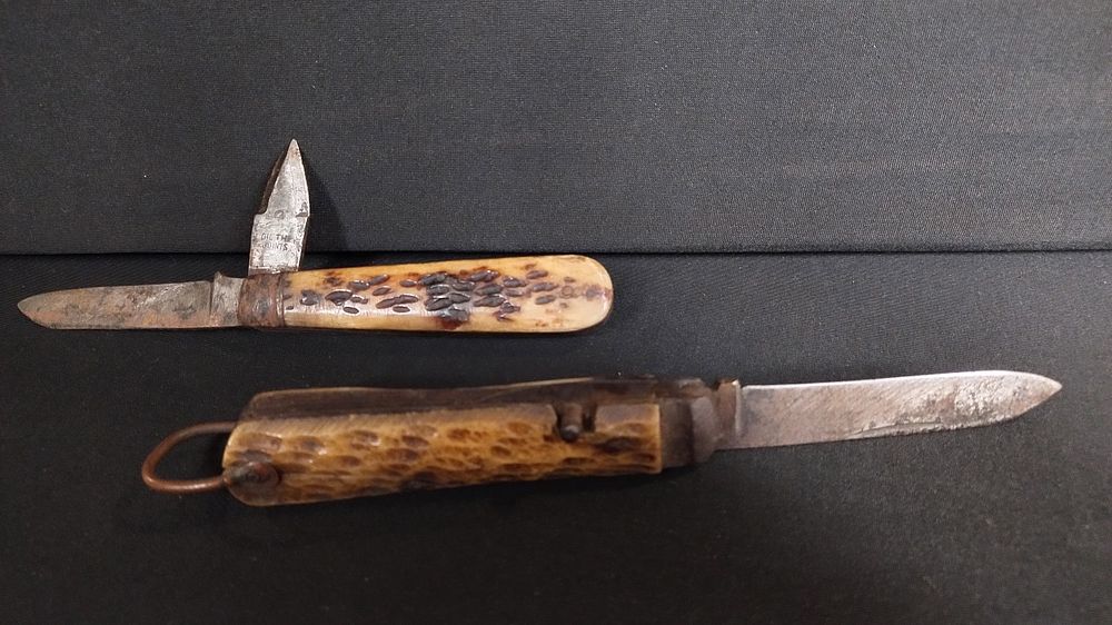Lot 280: Two World war Christmas knives.