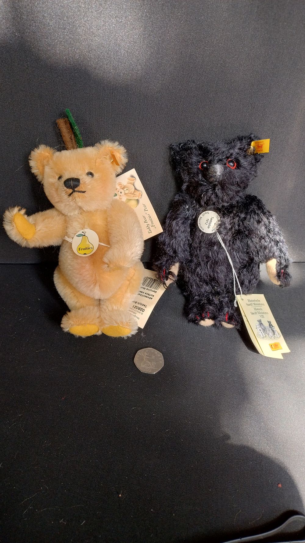 Lot 294: Two steiffs one Historic steiff miniatures 1912 black...