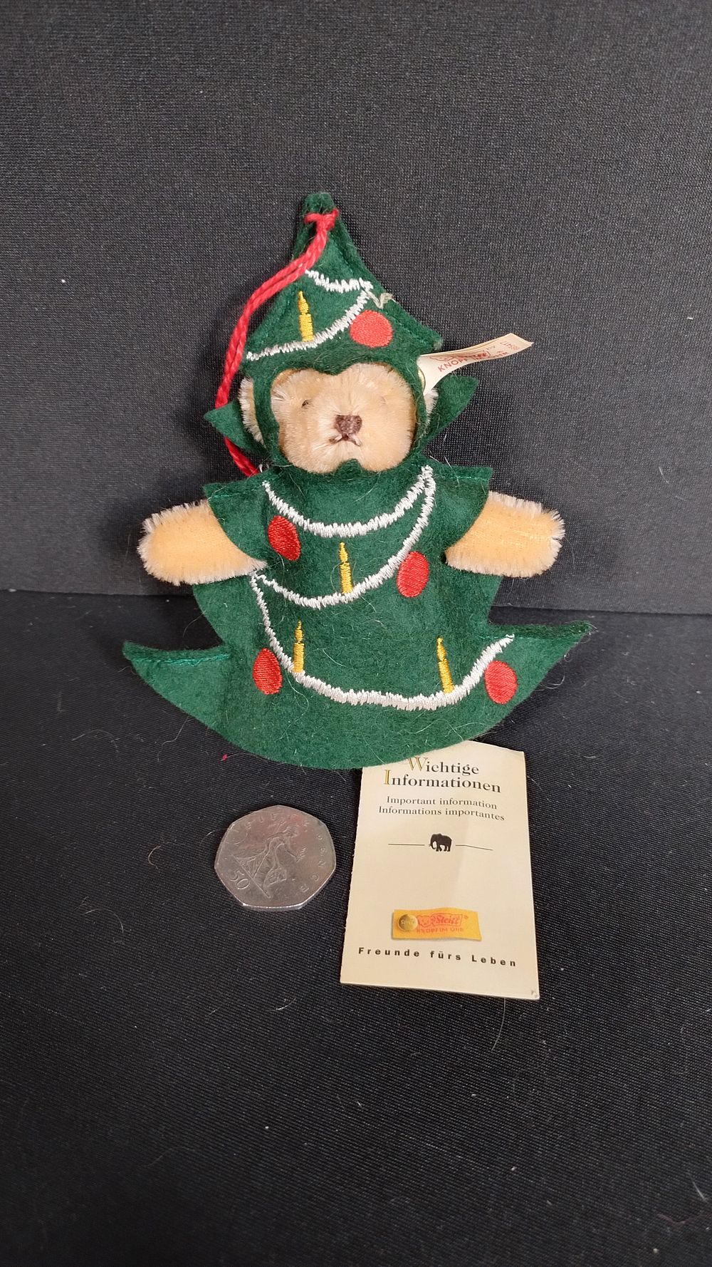 Lot 301: Steiff 1997 teddy Christmas tree hanger, measures 5...
