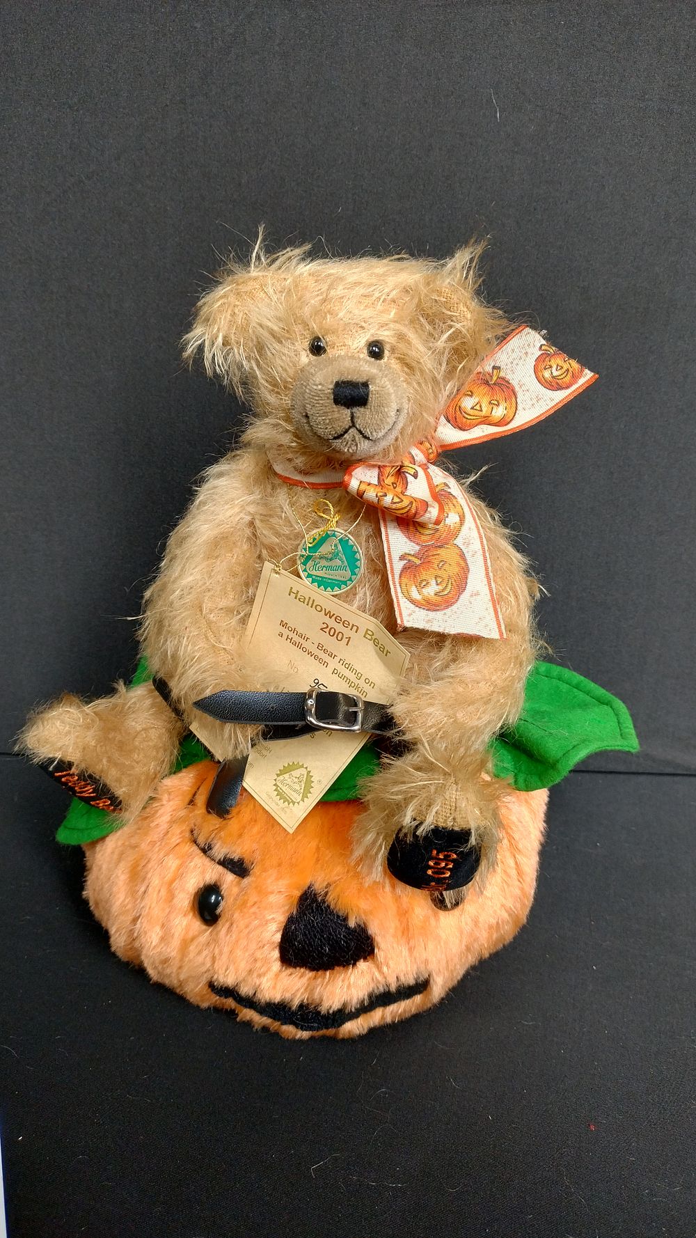 Lot 304: Collectable mohair Bear riding on a Halloween pumpkin...