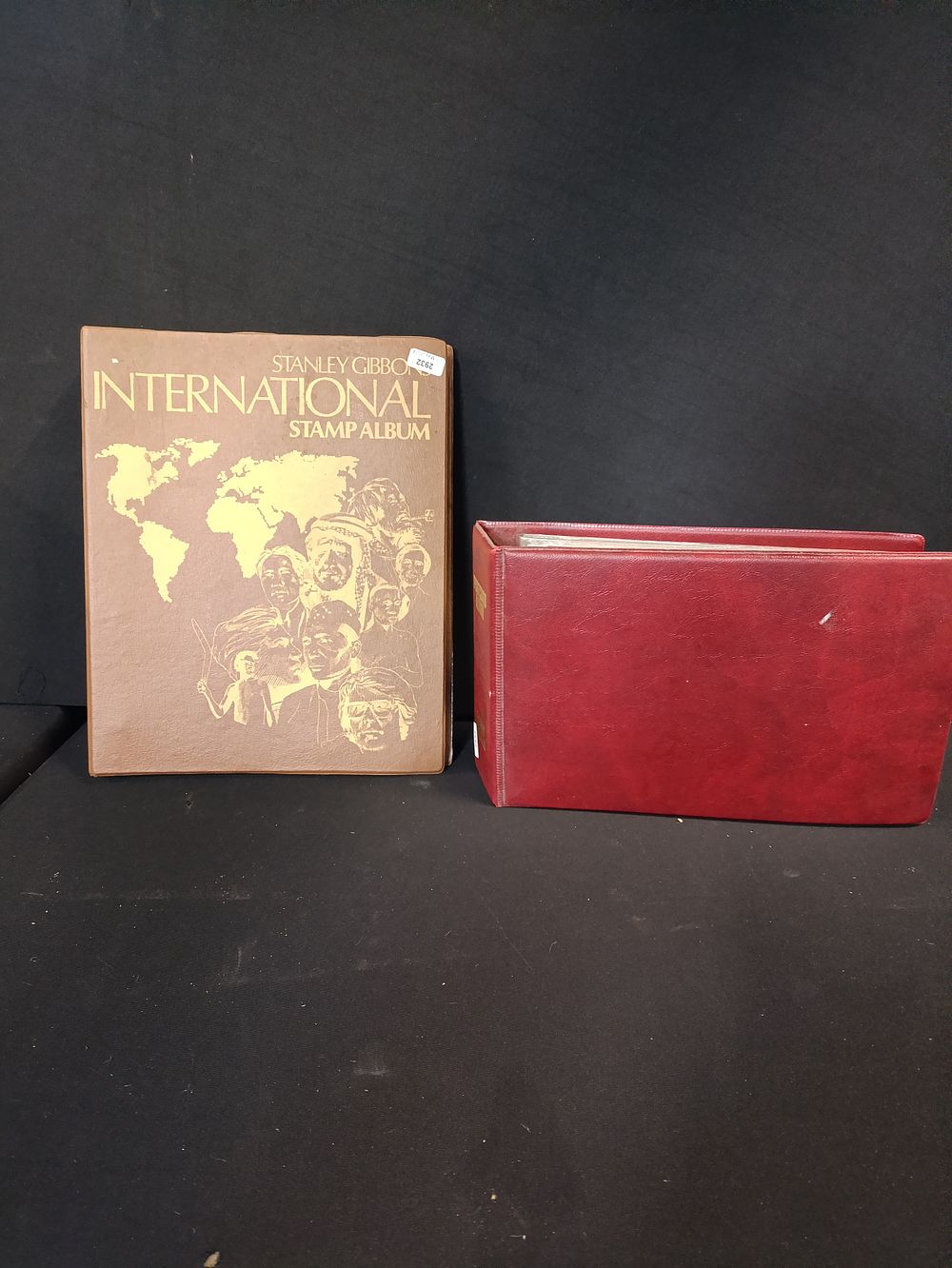 Lot 320: Red Book International stamp Collection and a postcard...
