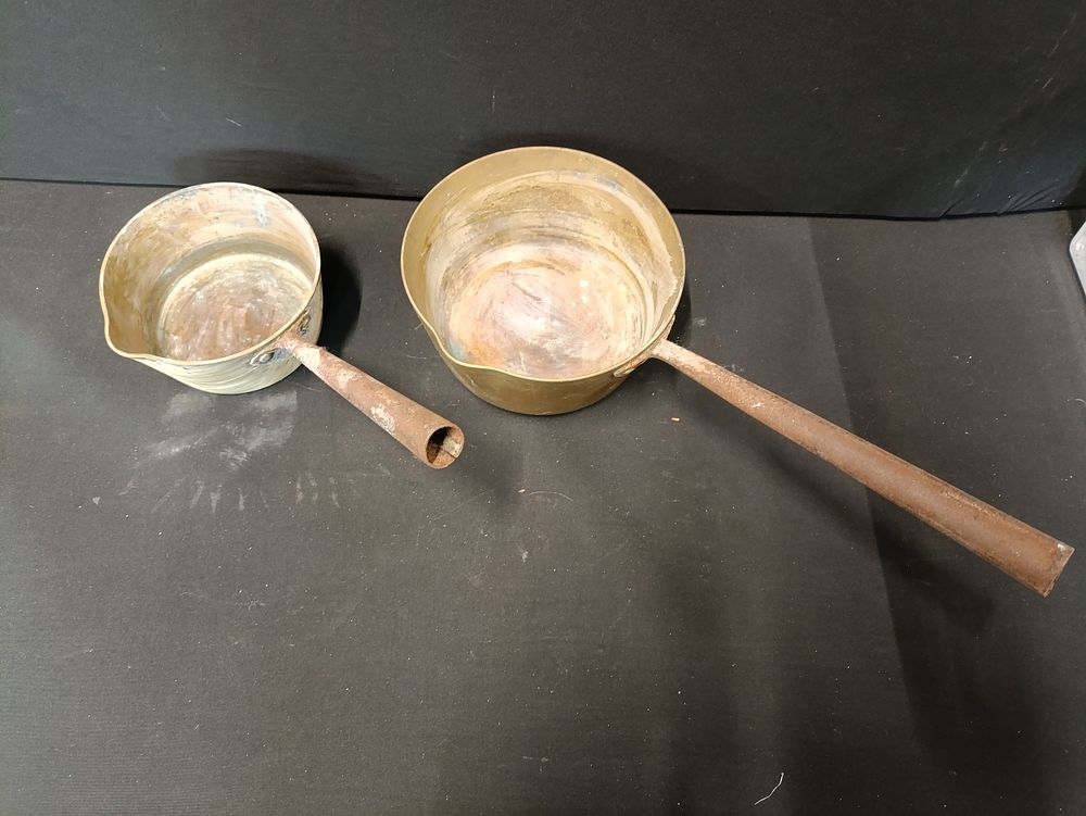 Lot 335: 2 heavy solid brass vintage pans