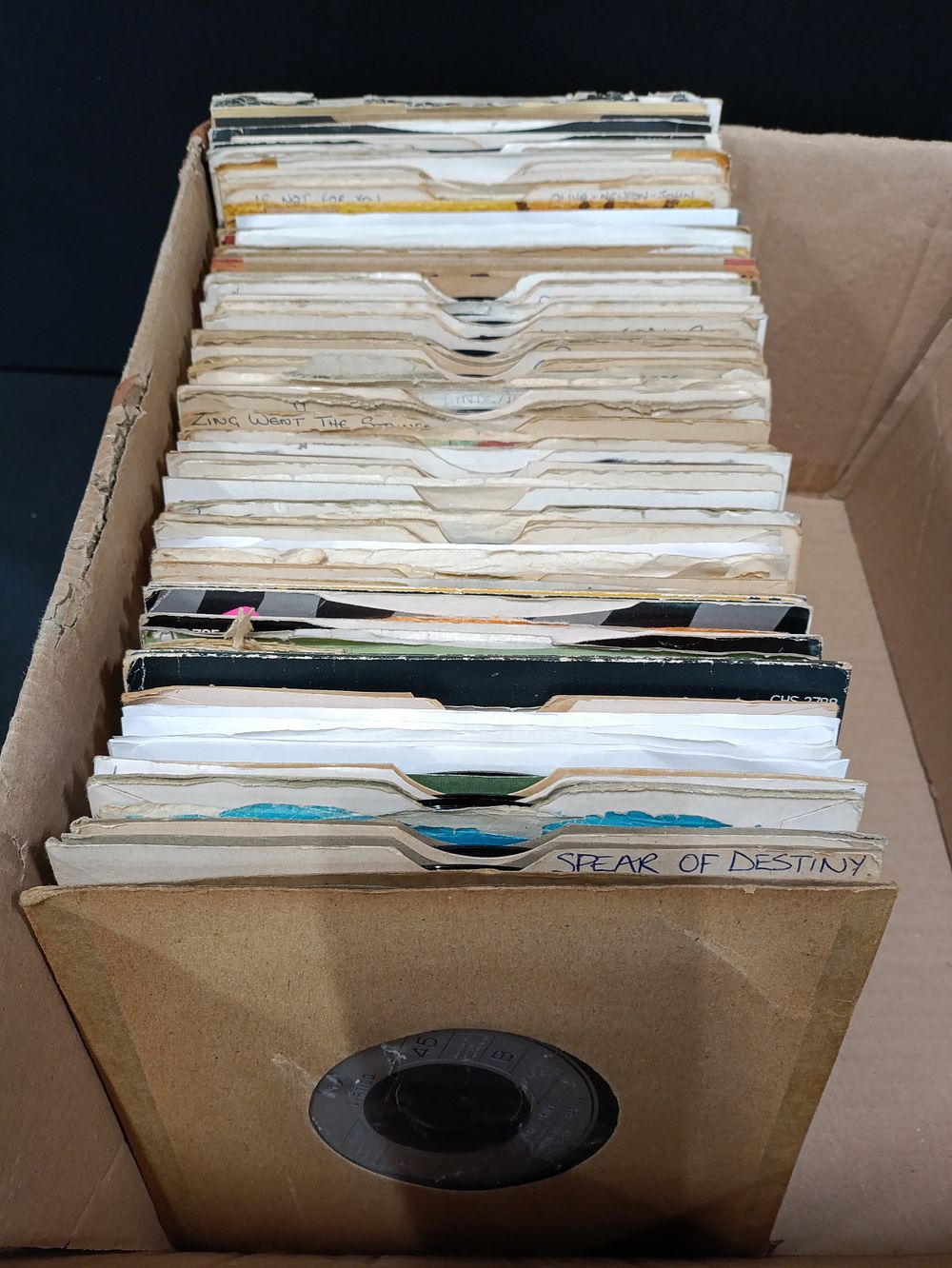 Lot 339: Approximately 100 7" vinyl singles from various genres...