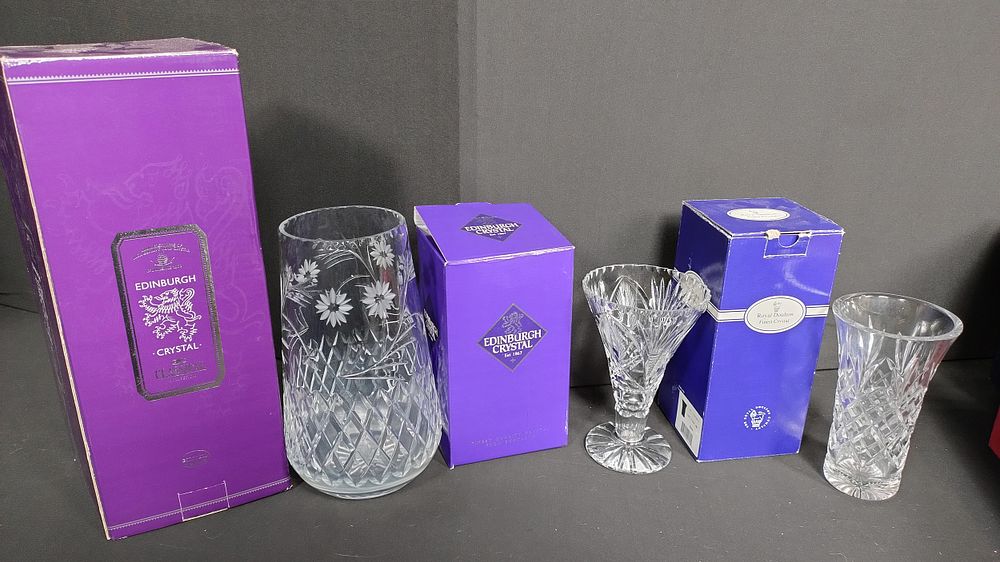 Lot 342: Two Edinburgh crystal vases measures 9 inches and...