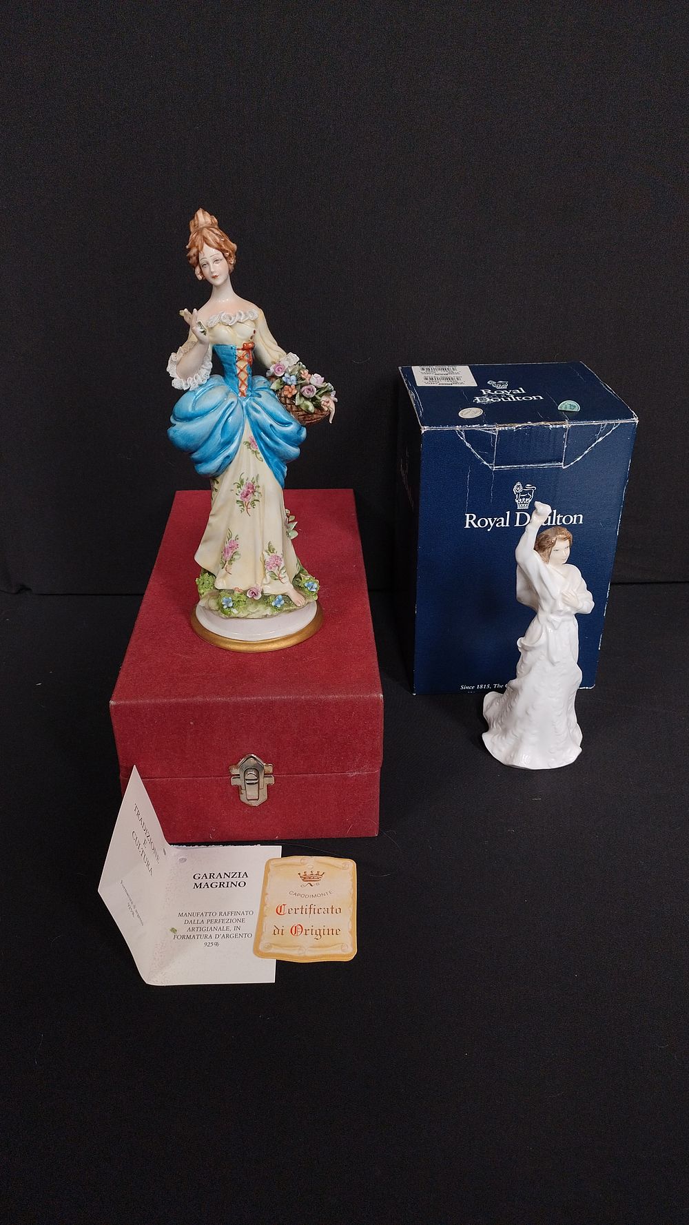 Lot 343: Capodimonte lady with flower basket measures 9 inches...
