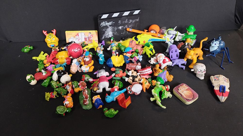 Lot 354: Box of vintage mixed toys from McDonald's and...