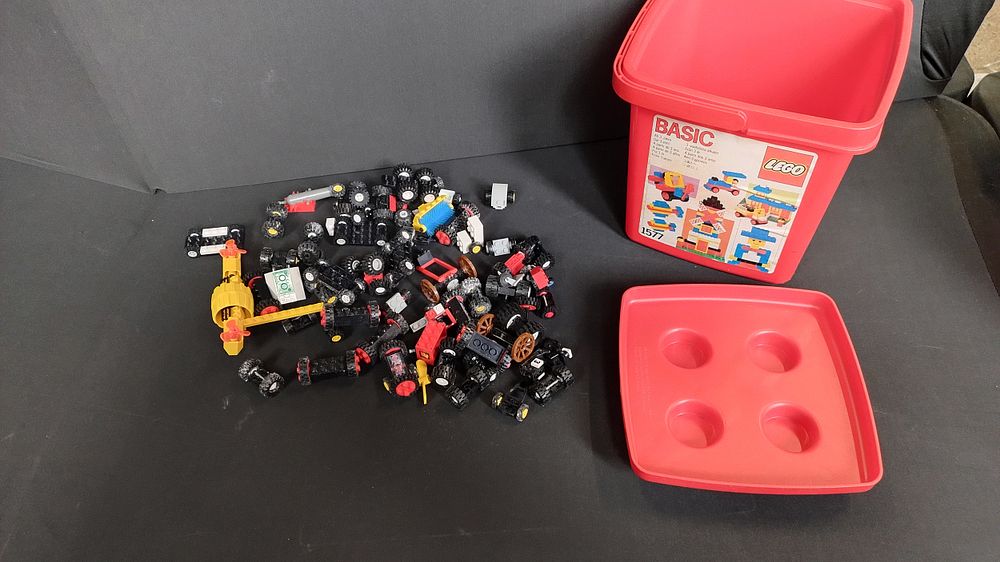 Lot 365: Various Lego wheels and a storage box with...