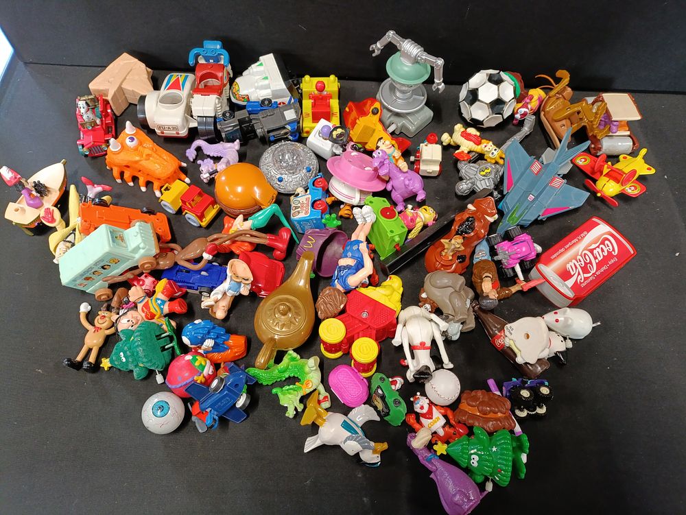 Lot 377: Large collection of vintage toys including mostly McDonald's...