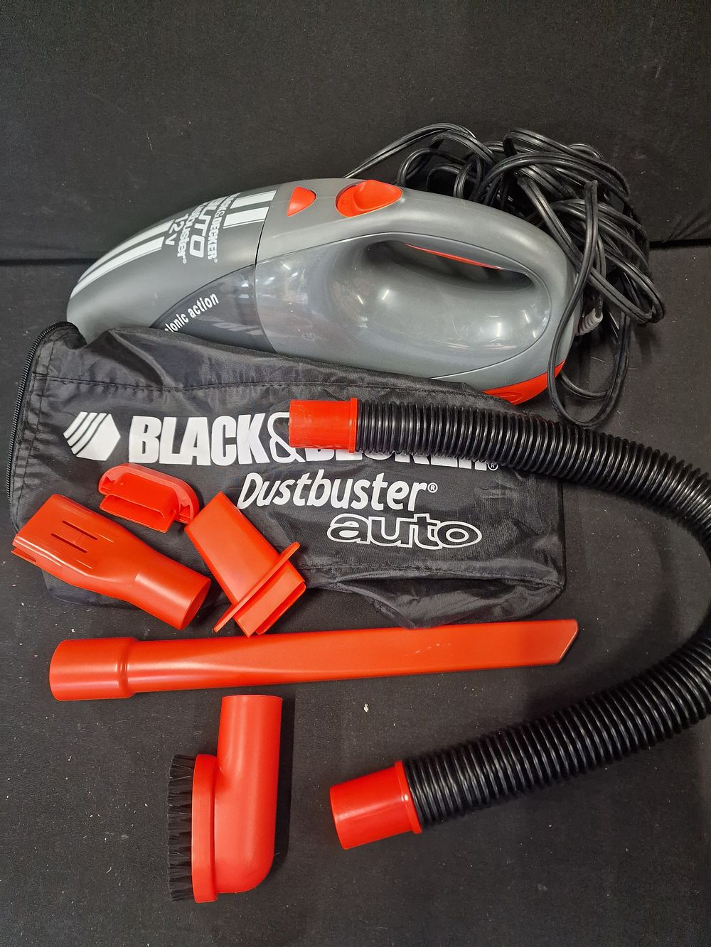 Lot 383: Black & Decker dust buster auto. With storage...
