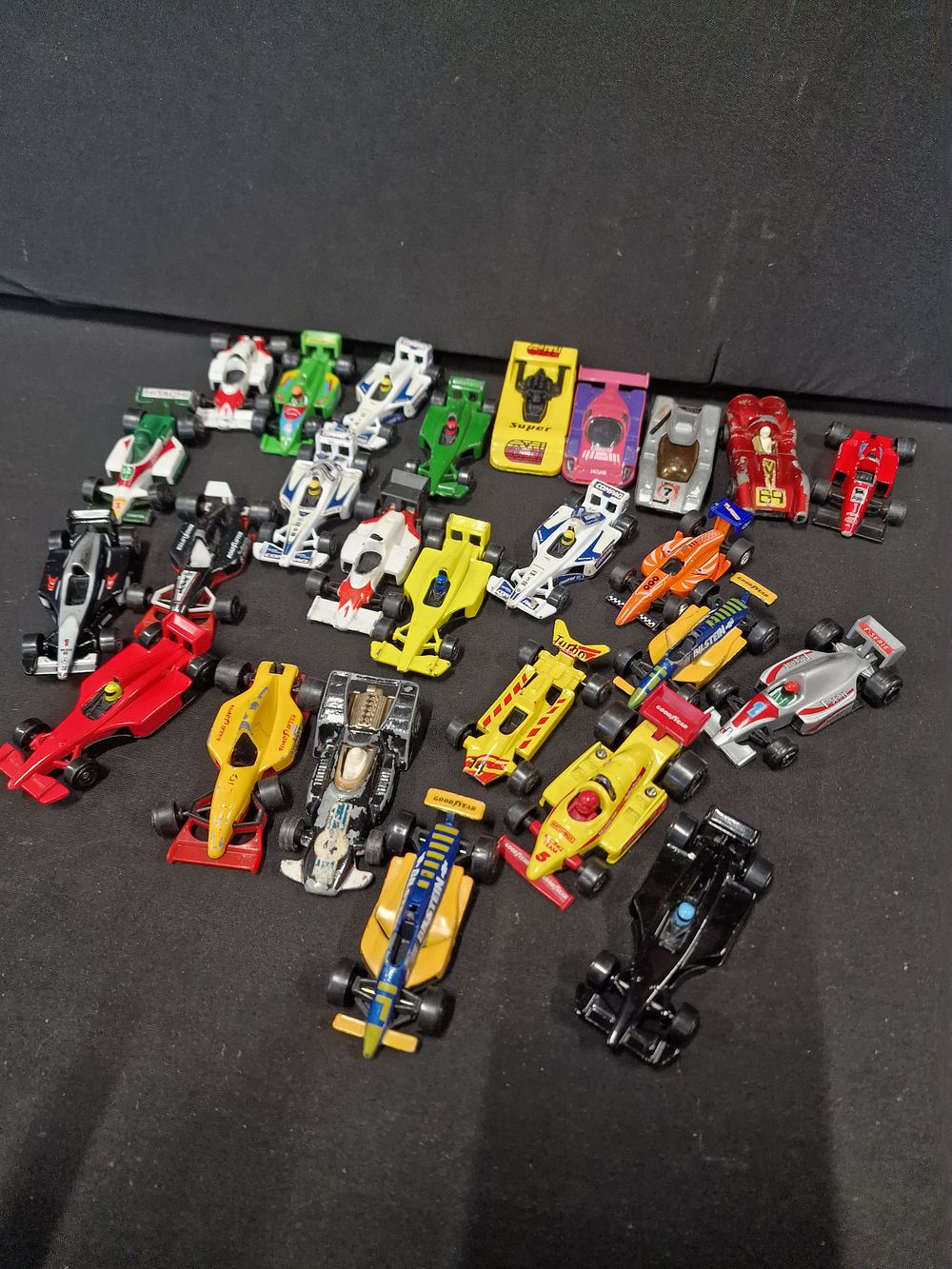 Lot 388: Approximately 26 formula one diecast cars. Matchbox, mojoeite,...