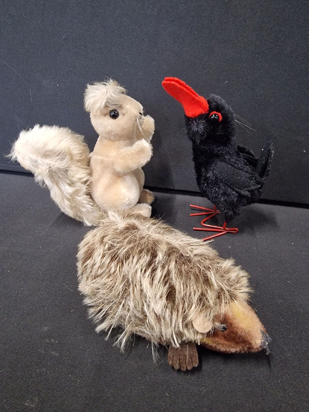 Lot 389: Three vintage Steiff - Hucky the raven, mohair...