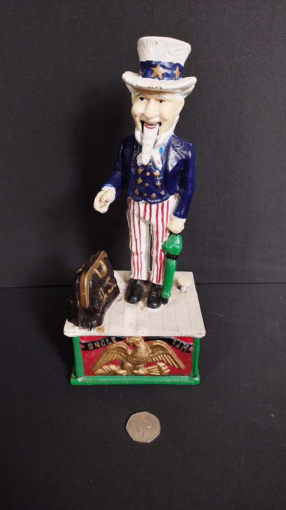 Lot 408: Cast Iron Uncle Sam Money Bank .