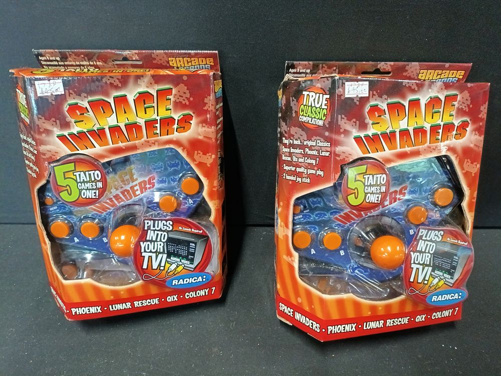 Lot 429: 2 vintage Radica plug and play arcade games...