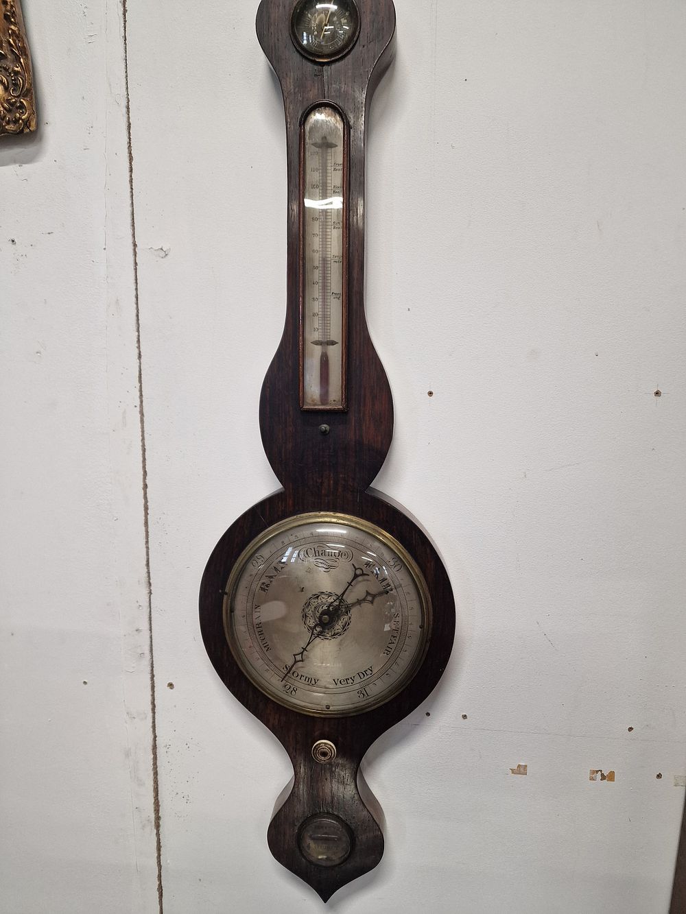 Lot 433: An antique wooden mercury banjo barometer