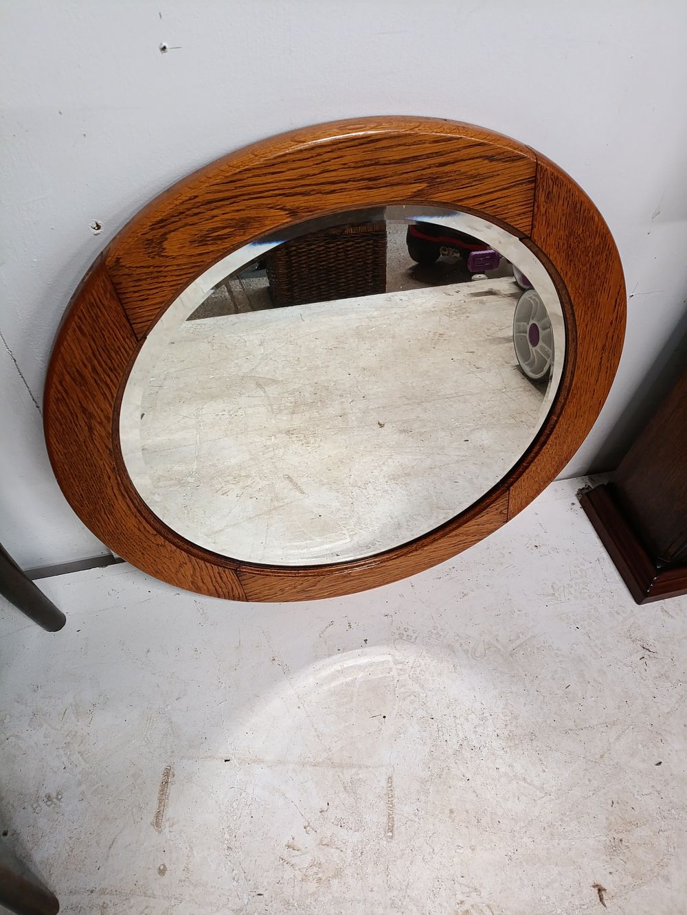 Lot 456: Vintage circular oak mirror approximately 63x63cm