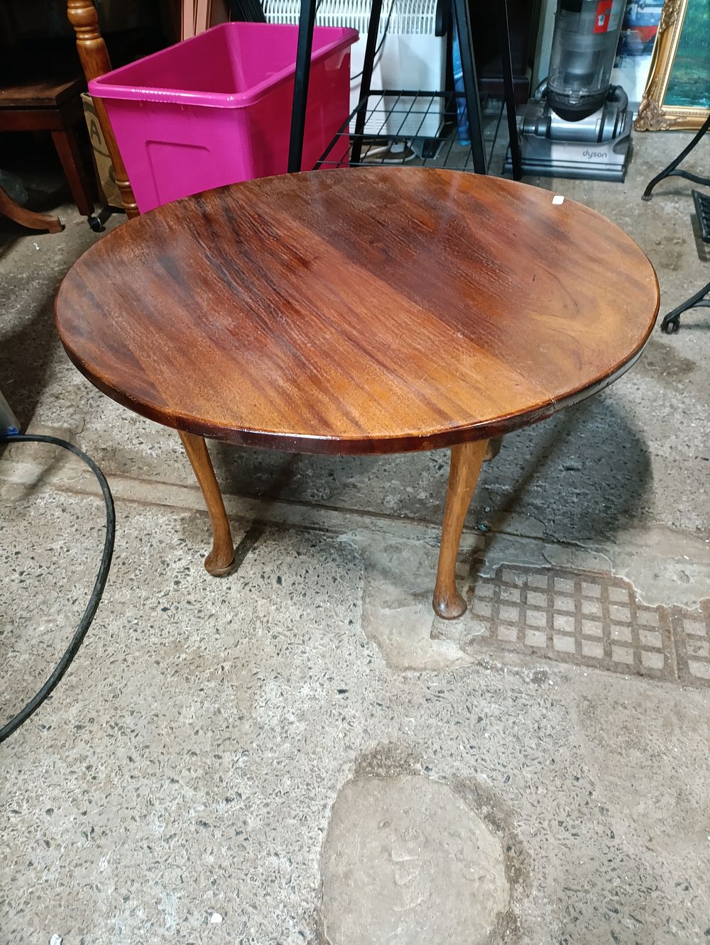 Lot 458: Vintage brown wooden round table approximately 69cm wide...