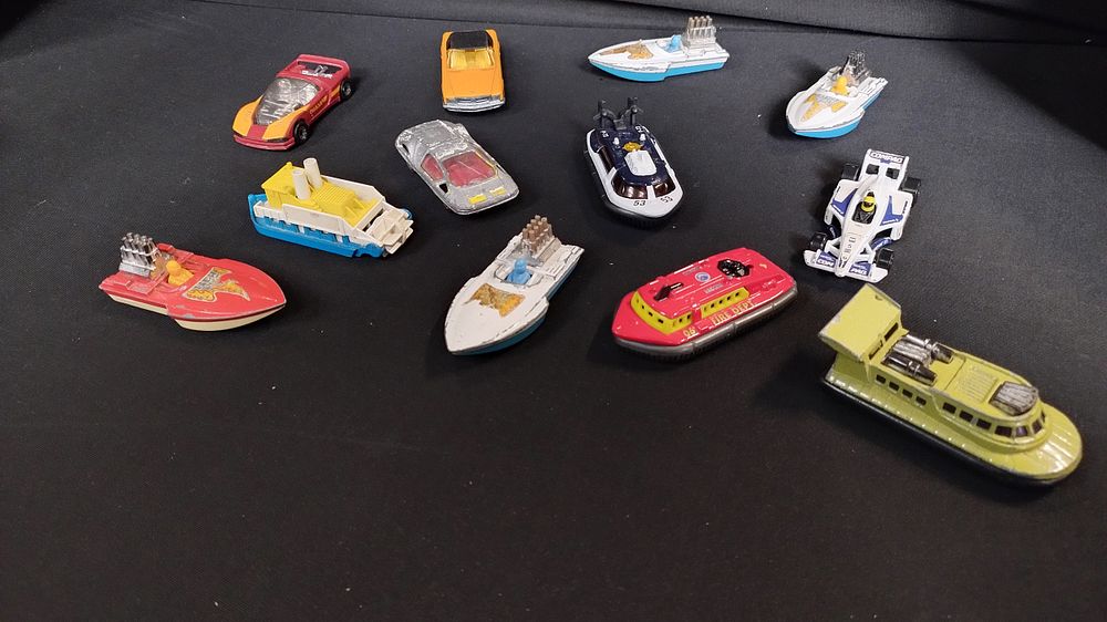 Lot 465: Vintage Matchbox diecast cars, hovercrafts, boats,