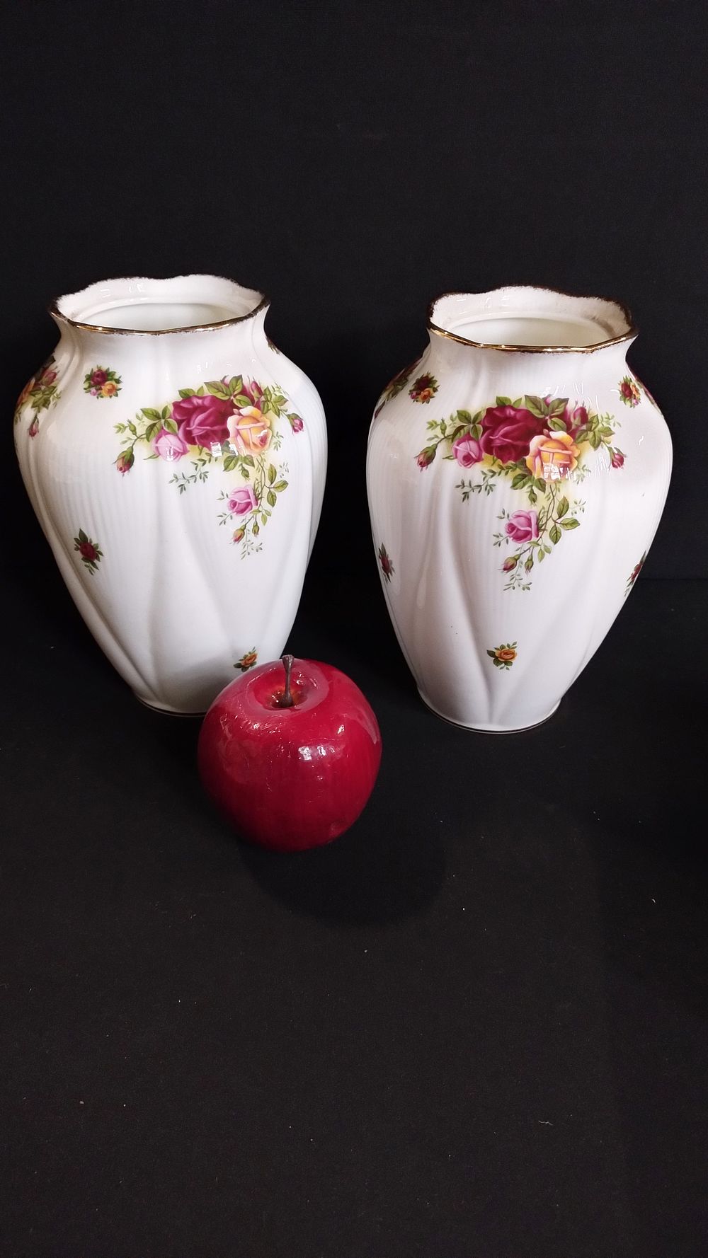 Lot 467: Royal Albert old country roses vases with gold...