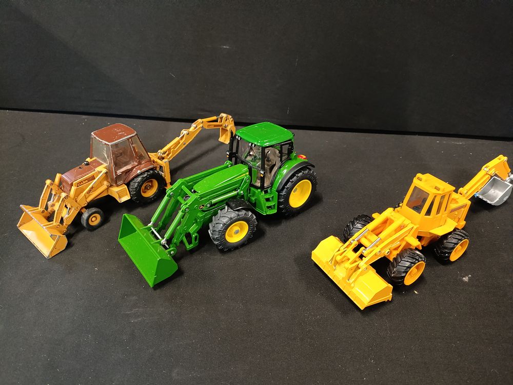 Lot 58: A model John Deere tractor and 2 digger...