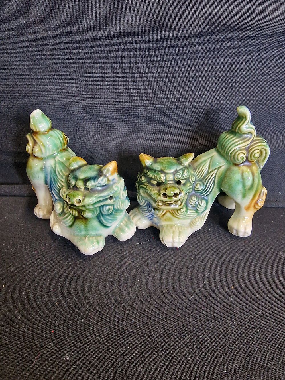 Lot 71: A pair of vintage Chinese ceramic foo dogs