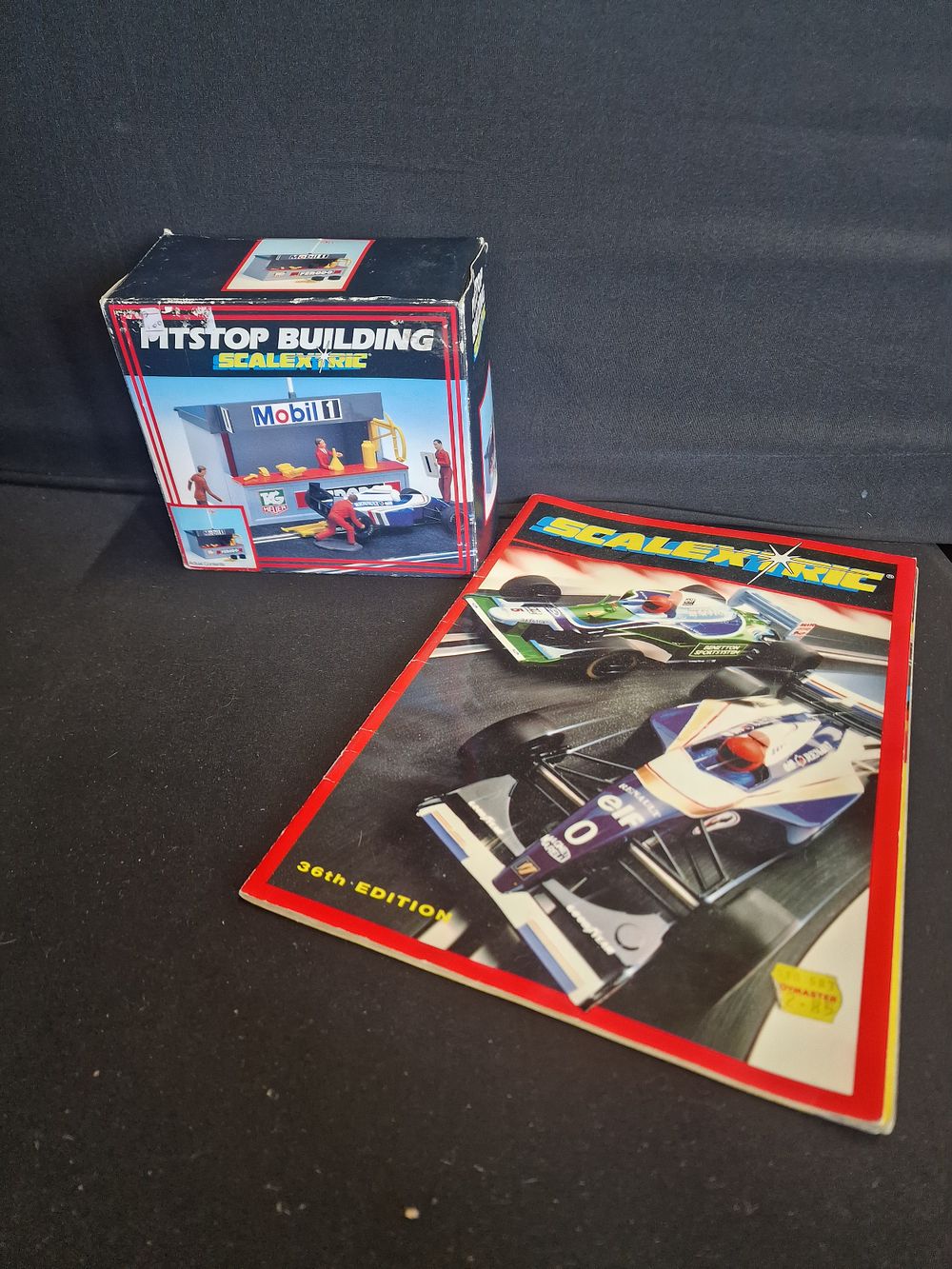 Lot 73: Scalextric Pitstone building and 36th edition magazine