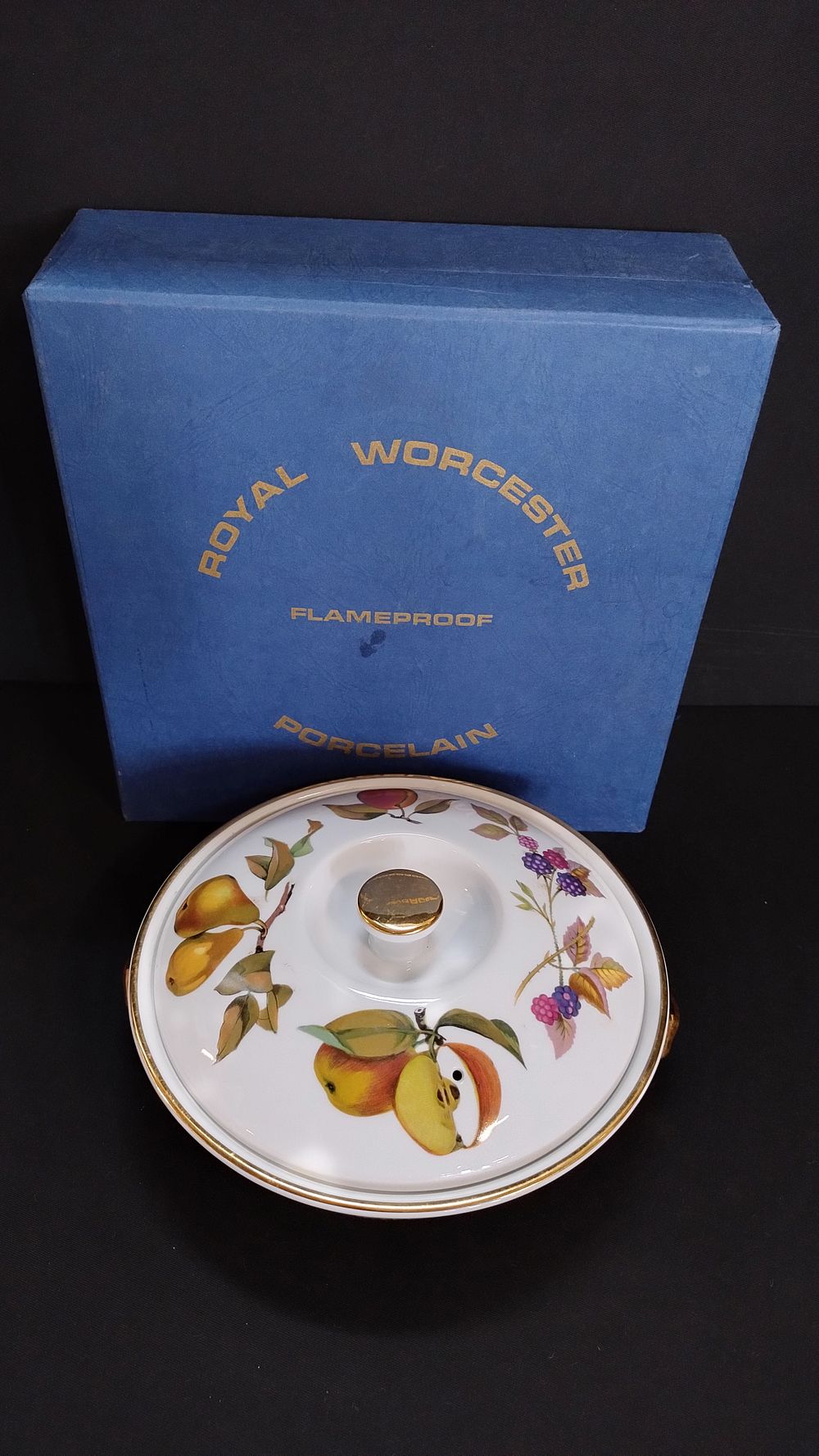 Lot 113: Royal Worcester of England. In design Evesham Gold....