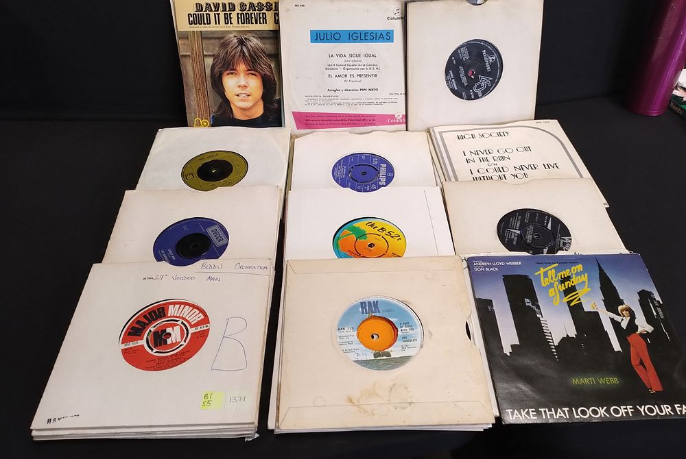 Lot 157: 100 seven inch singles various artists and genres