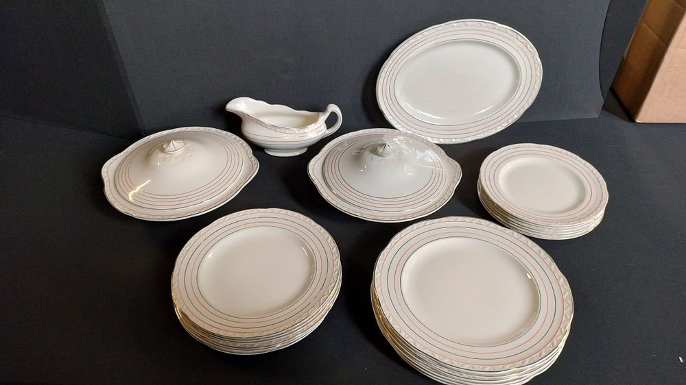 Lot 164: Twenty two piece Falcon ware dinner set, red...
