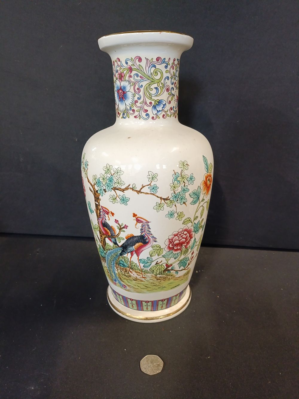 Lot 255: Vintage oriental vase with floral and peacock design...