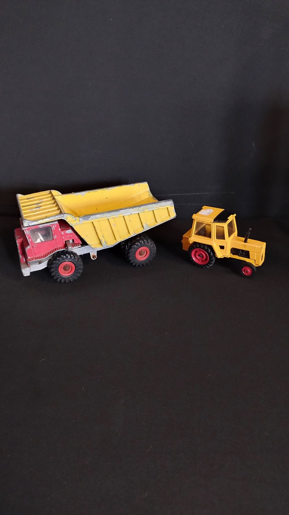 Lot 265: vintage Dinky dumper truck and corgi Tractor