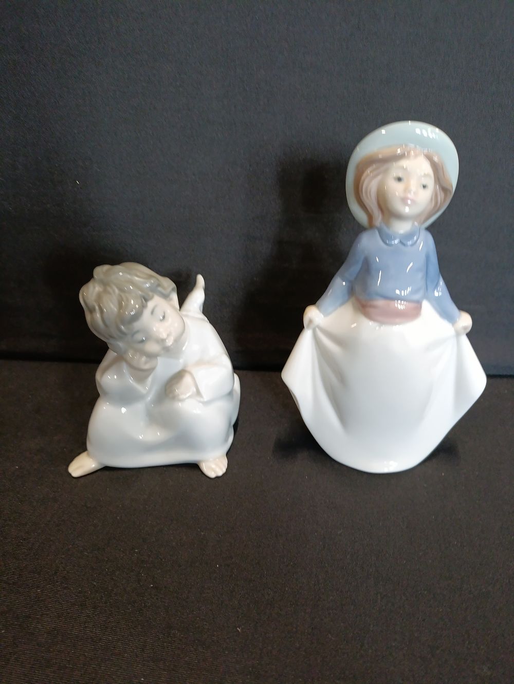 Lot 339: Lladro figurines "Sleeping angel" and a Nao by...