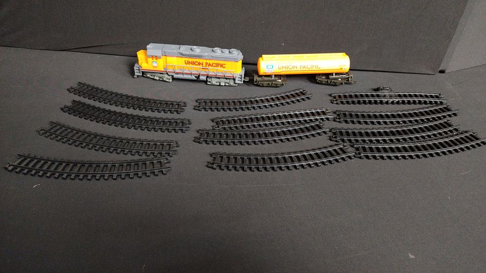 Lot 411: Union Pacific train and carriage with track
