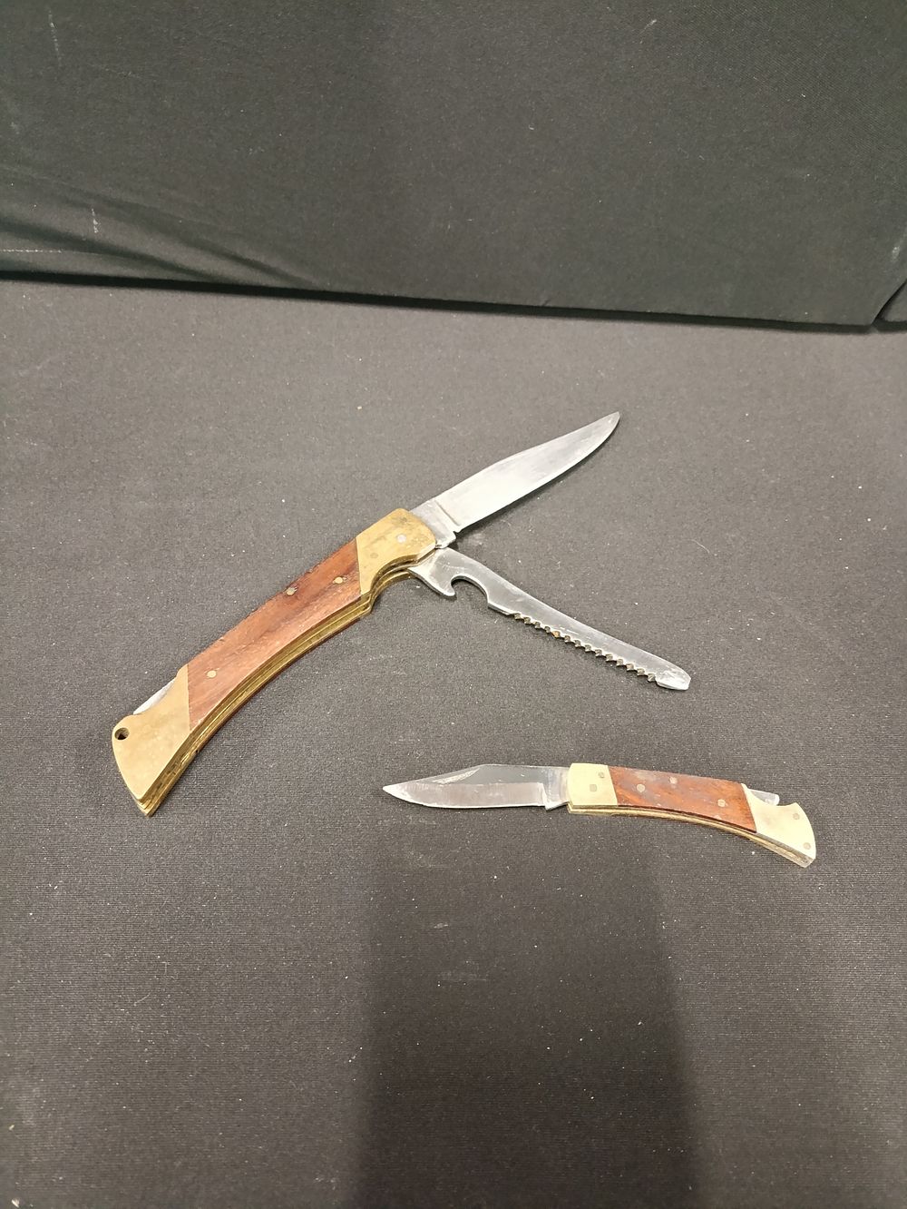 Lot 504: 2 vintage lock knives with brass fittings including...