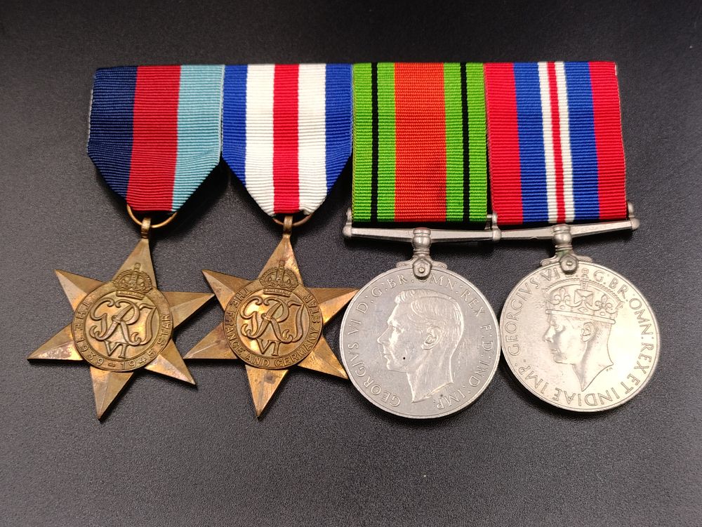 Lot 100: Set of 4 WWII medals on bar pin...