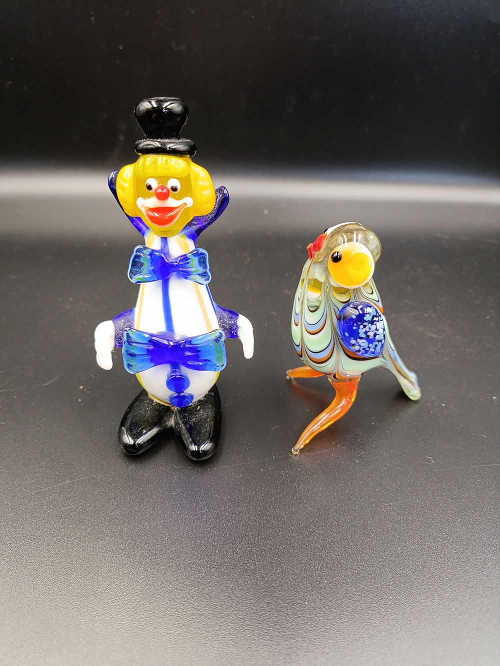 Lot 119: Murano style hand blown glass clown and bird...