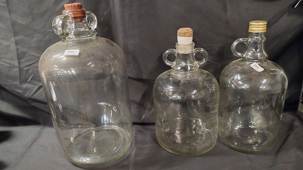 Lot 130: 3 Demi-johns with stoppers