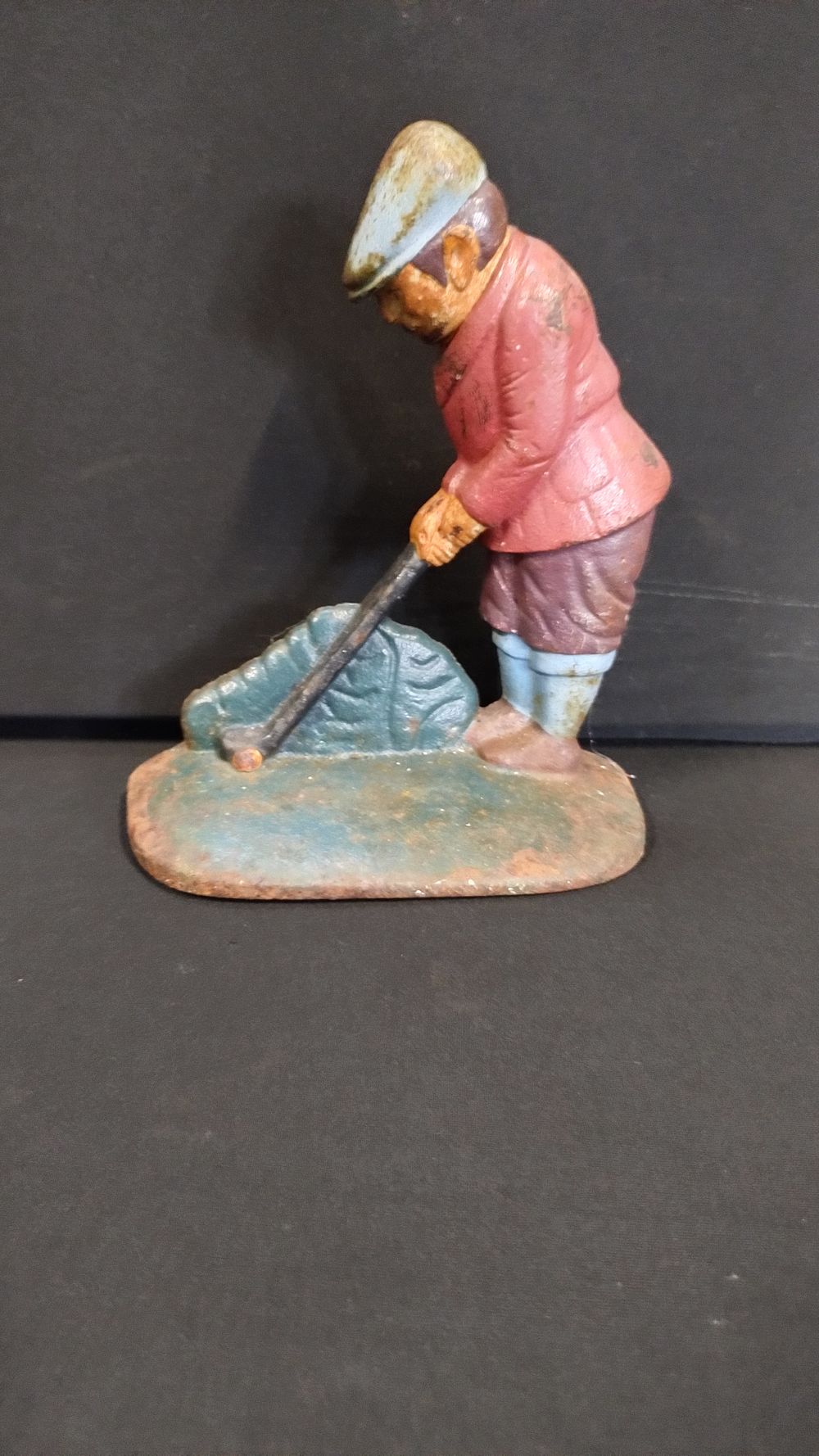 Lot 151: Cast metal golfer door stop