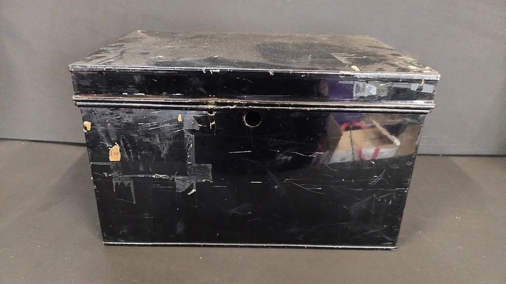 Lot 154: Black Metal chest with carry handles