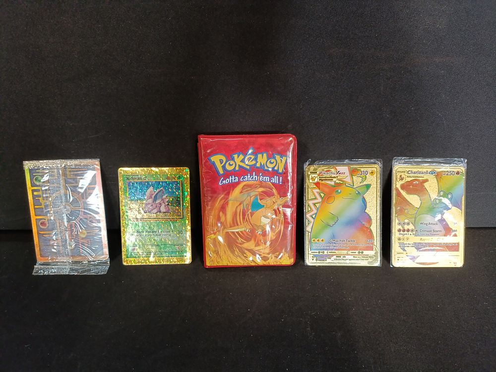 Lot 240: Selection of Pokémon cards including a sealed Ancient...