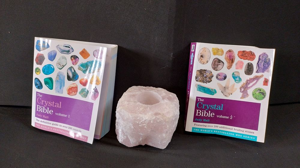 Lot 271: Rose quartz candle holder and 2 crystal bible...