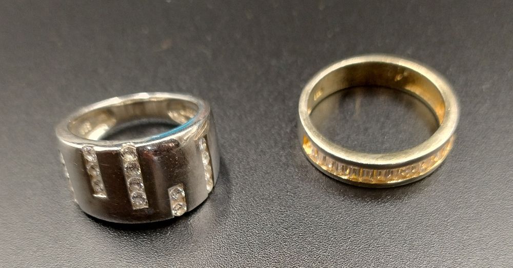 Lot 300: Two Sterling silver ring with cubic zirconia ring...