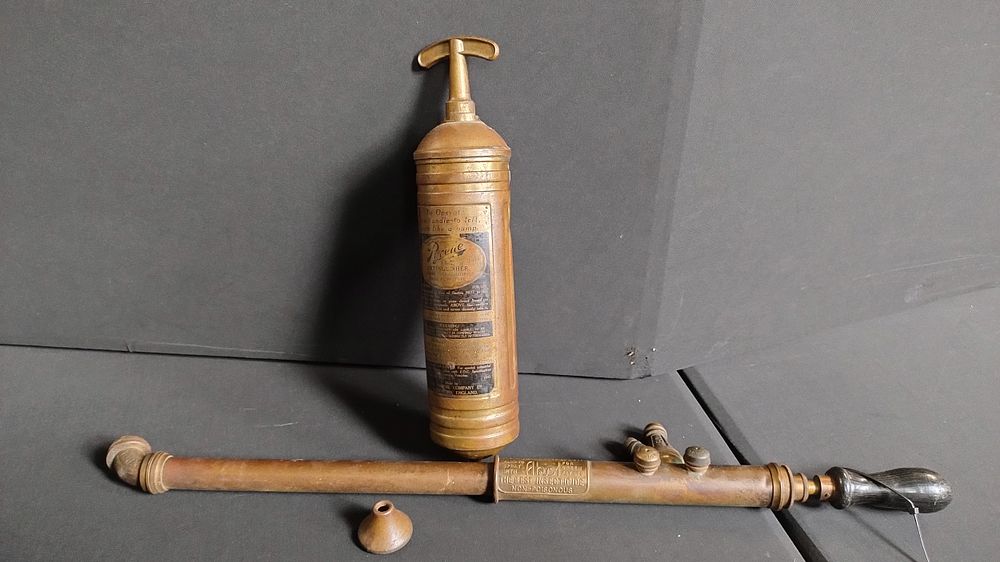 Lot 327: Antique pyrene brass fire extinguishers