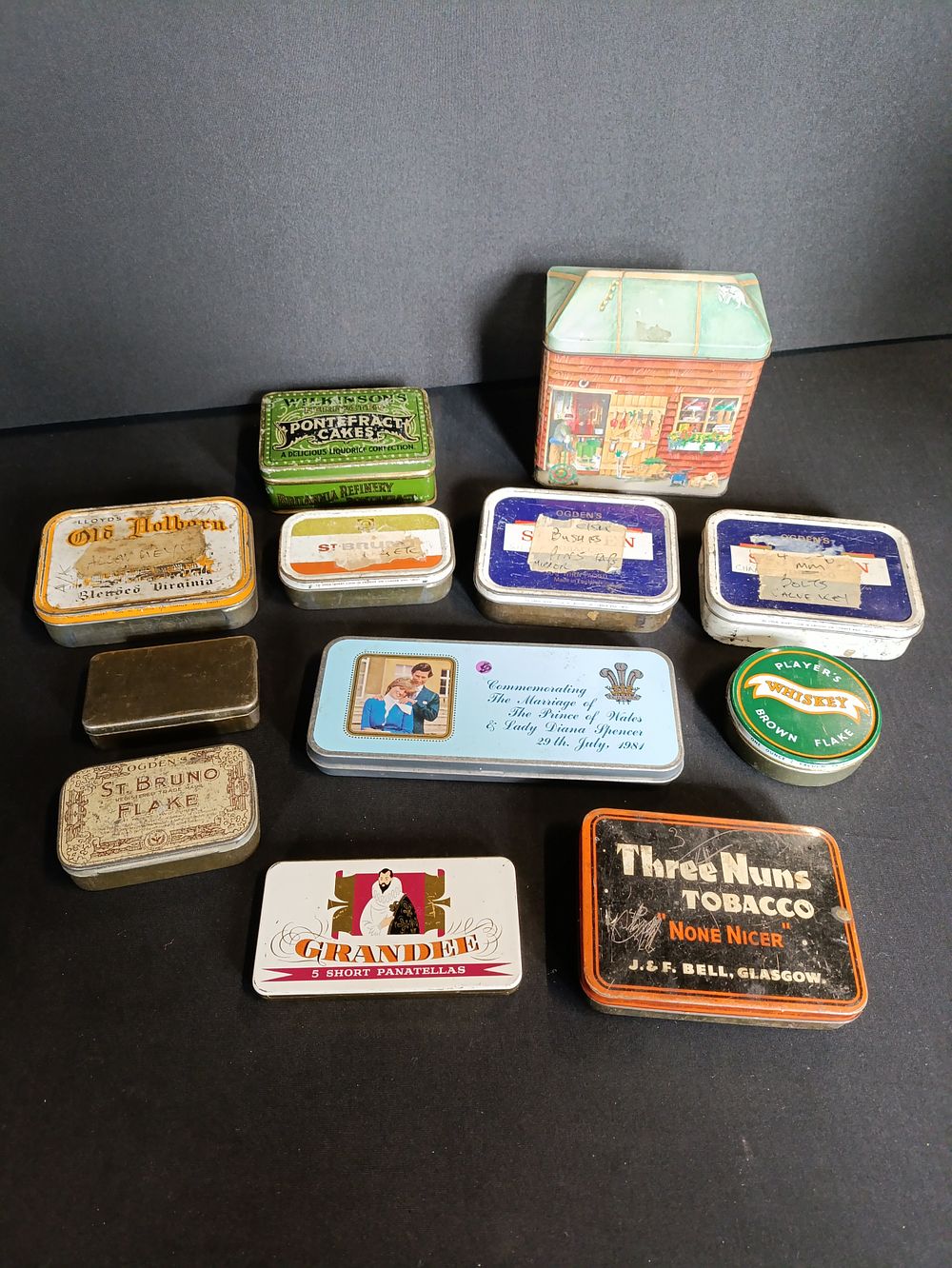 Lot 334: Collection of vintage tins
