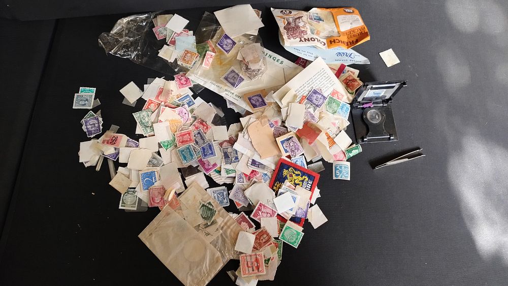 Lot 338: Collection of vintage stamps, stamp viewer and tweezers